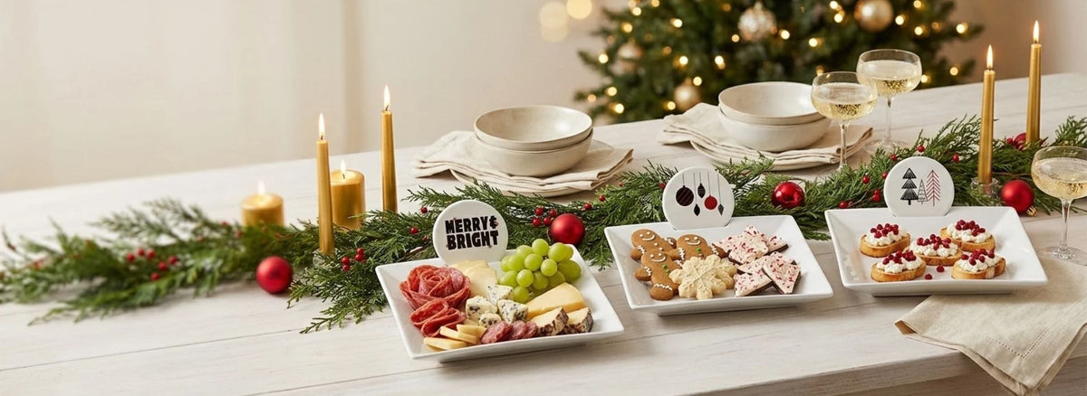 Three Jane1530 Party Platters with Merry & Bright, ornament and tree discs on a holiday table